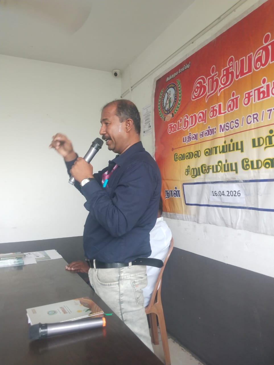Speaker addressing members at an ICCSL awareness meeting