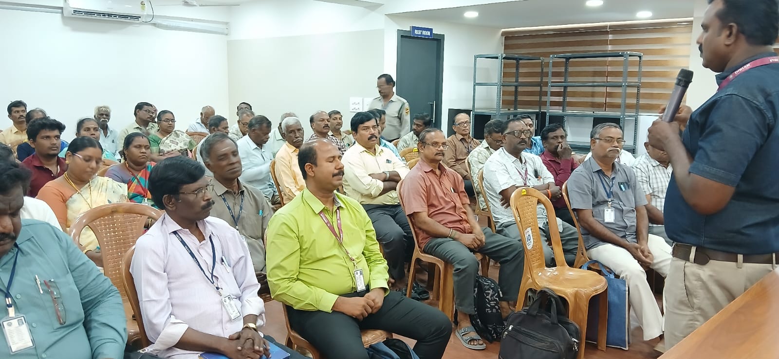 J. Augustin addressing policyholders at an awareness meeting