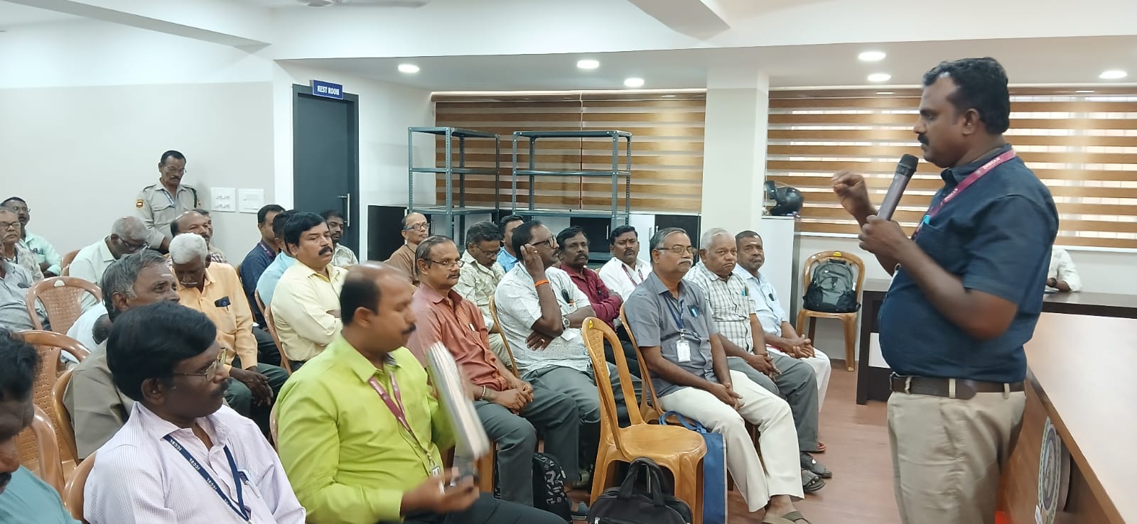 Audience attending an LIC insurance awareness session